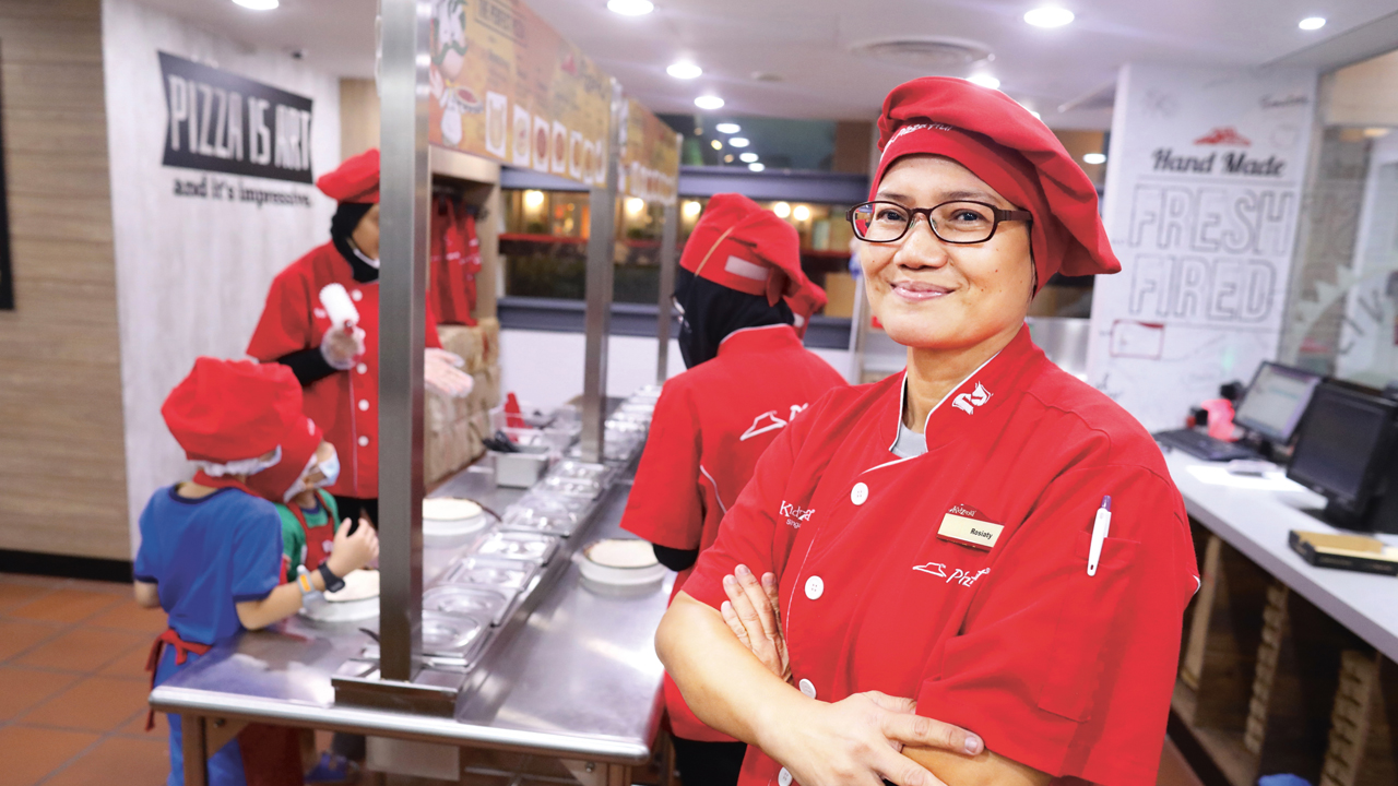 52-year-old Rosiaty Seah, a Zupervisor at Pizza Hut believes that giving kids insight into various roles and professions go a long way in providing kids with a better idea of what they want to do when they are older.