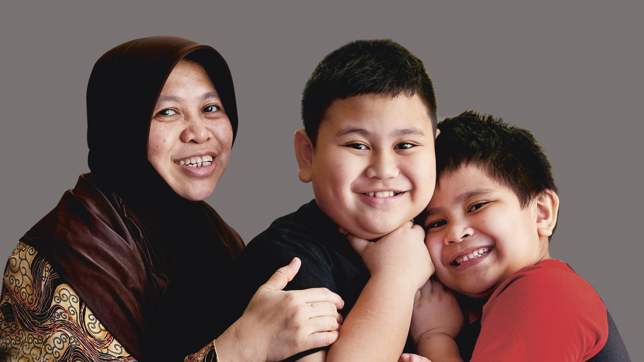 With help from NTUC U Care Assistance Programmes, Madam Nisa was able to ease some of the costs of her two schoolgoing children's education, and ensuring that they benefit from the same opportunities as others. (Photo Source: NTUC This Week)