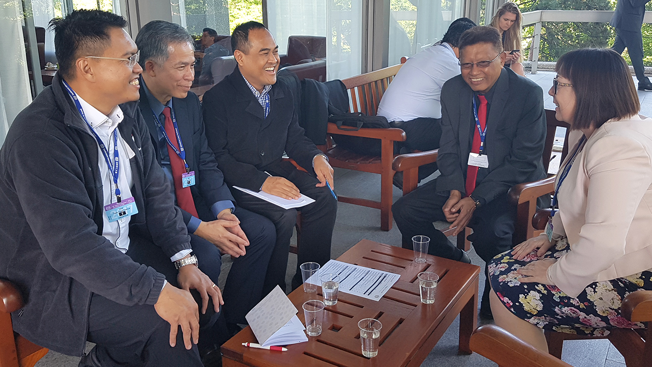 (From left to right) NTUC Assistant Secretary-General Patrick Tay, NTUC Assistant Secretary for Financial Affairs Yeo Chun Fing, Deputy Executive Secretary of Education Services Union and Singapore Port Workers Union Shamsul Kamar and NTUC President Emeritus John De Payva engrossed in a fruitful discussion with Esther Lynch from the European Trade Union Confederation.