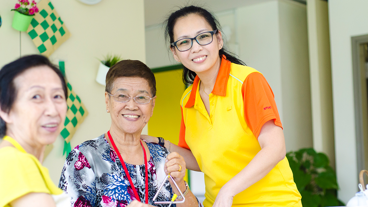 “I want to set a positive example to my children that we must always embrace learning and improve ourselves,” says NTUC Health Silver Circle Dementia Care Coordinator Sharon Kwek. (Photo Source: NTUC This Week)