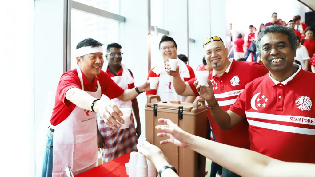 Union leaders toast with cups of Teh Tarik – specially prepared by SG Ng. 