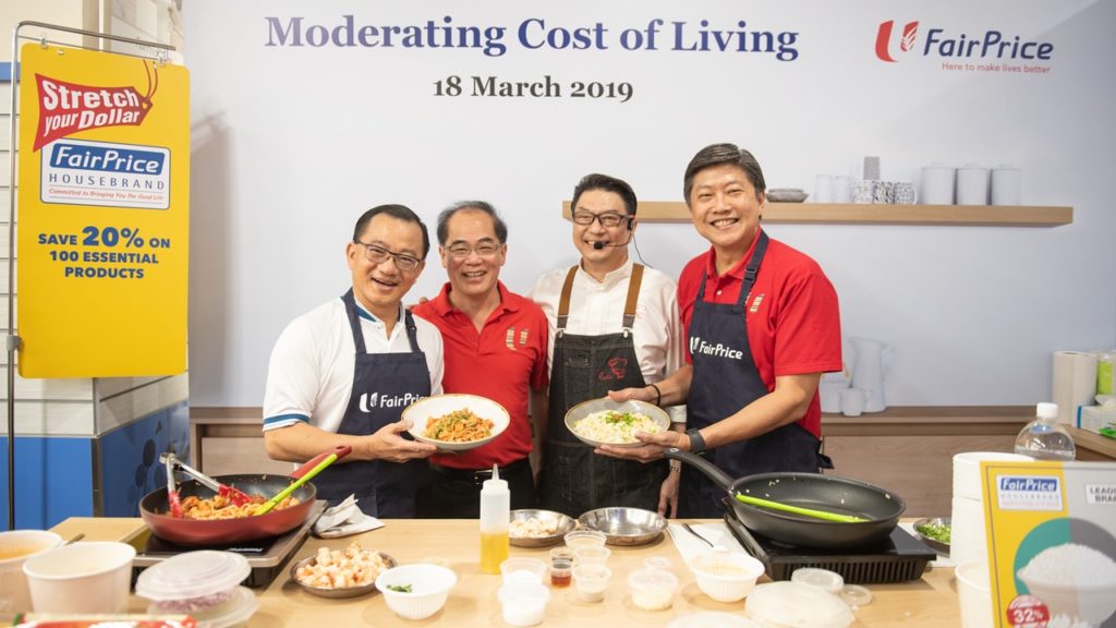 From left: FairPrice CEO Seah Kian Peng, NTUC Enterprise Executive Director Kee Teck Koon, Chef Eric Teo and NTUC Secretary-General Ng Chee Meng whipping up a delicious lunch with housebrand ingredients. 