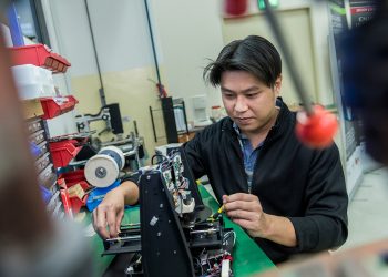 In the two years that design engineer Reese Wong has worked at iPtec, he’s had to pour in many hours researching the latest updates across the vast medical landscape before even getting started on the actual design work. (Photo Source: NTUC This Week)