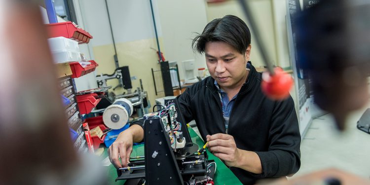 In the two years that design engineer Reese Wong has worked at iPtec, he’s had to pour in many hours researching the latest updates across the vast medical landscape before even getting started on the actual design work. (Photo Source: NTUC This Week)