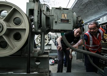 Understanding more about their work from 58-year-old, Patrick Tung, a lift technician (Photo Source: NTUC)