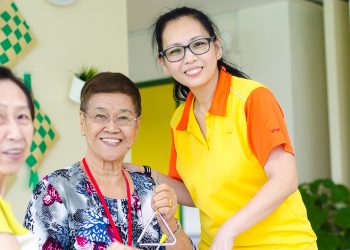 “I want to set a positive example to my children that we must always embrace learning and improve ourselves,” says NTUC Health Silver Circle Dementia Care Coordinator Sharon Kwek. (Photo Source: NTUC This Week)