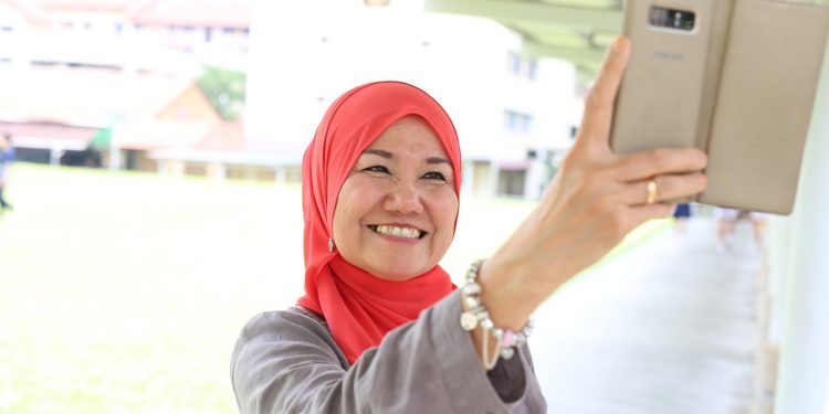 Savvy seniors like Zahrah Abdul Wahab are tapping the power of social media to keep in touch with family and friends