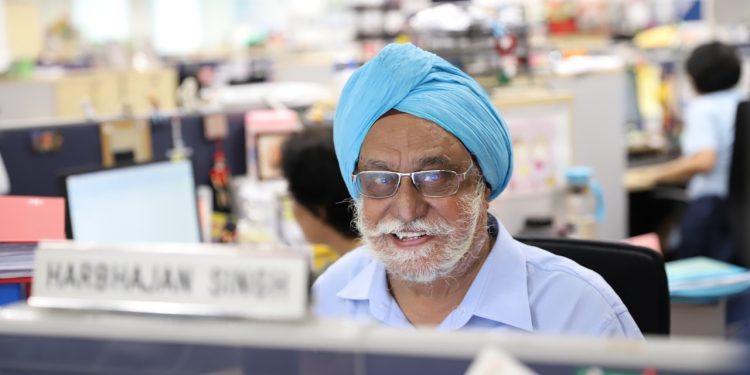 Despite his age, Mr Harbhajan Singh has gotten familiar with technology at work.
