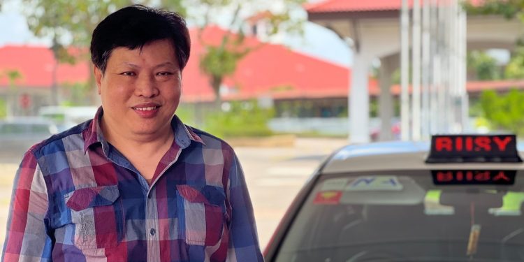Business as Usual for This Taxi Driver, Even on Lunar New Year