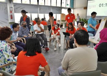 A focus group discussion with caregivers conducted by NTUC in 2023.