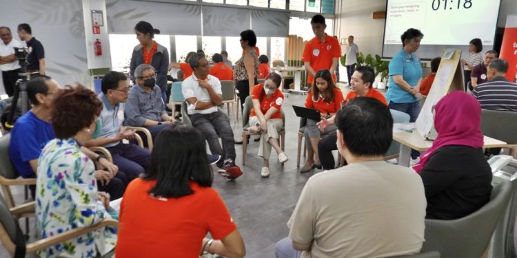 A focus group discussion with caregivers conducted by NTUC in 2023.