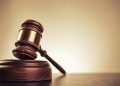 Two Singaporeans and a Company Charged for False Employment Declarations, Kickbacks